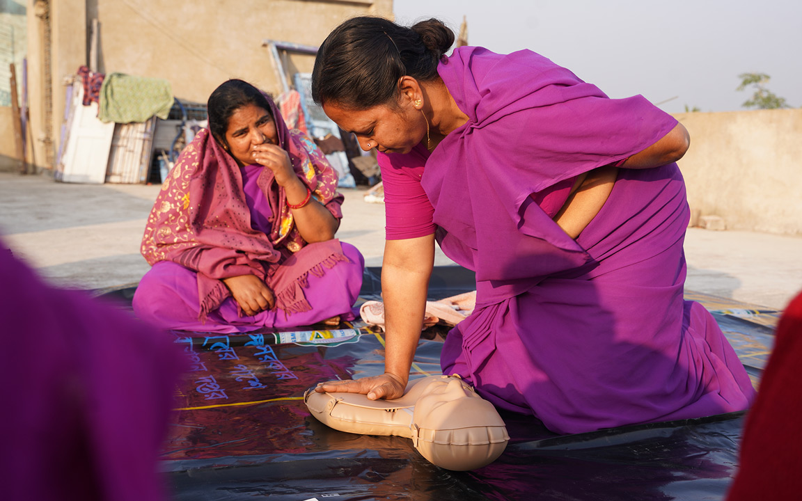 Woman performing CPR