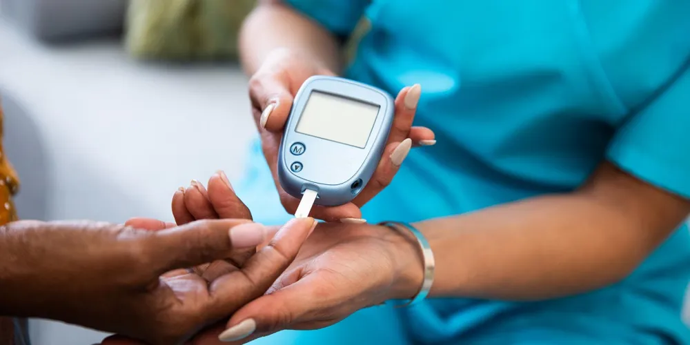 Nurse checking diabetes