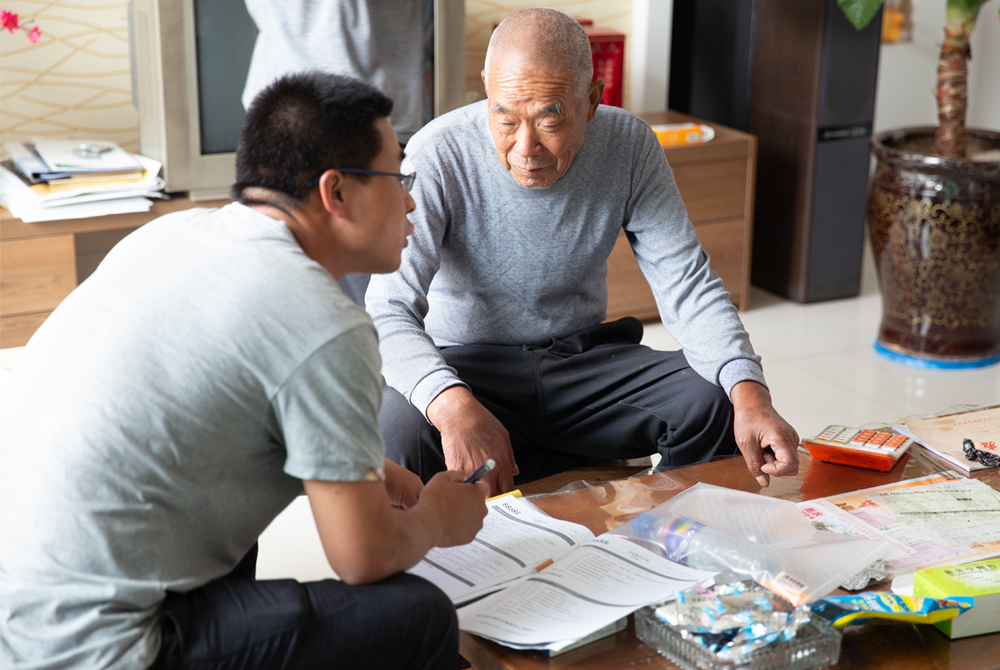 Researchers working with study participants of the SSaSS study in China, examining the effects of a potassium based salt substitute on cardiovascular health
